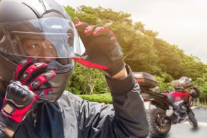 Man with Motorcycle - Motorcycle accident in Minnesota - Sand Law LLC