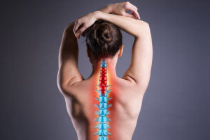 woman with sciatica - minnesota back pain and spinal injury lawyers - sand law llc